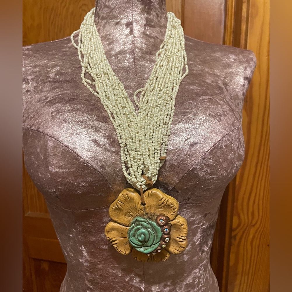 Unique seed bead & giant carved flower necklace